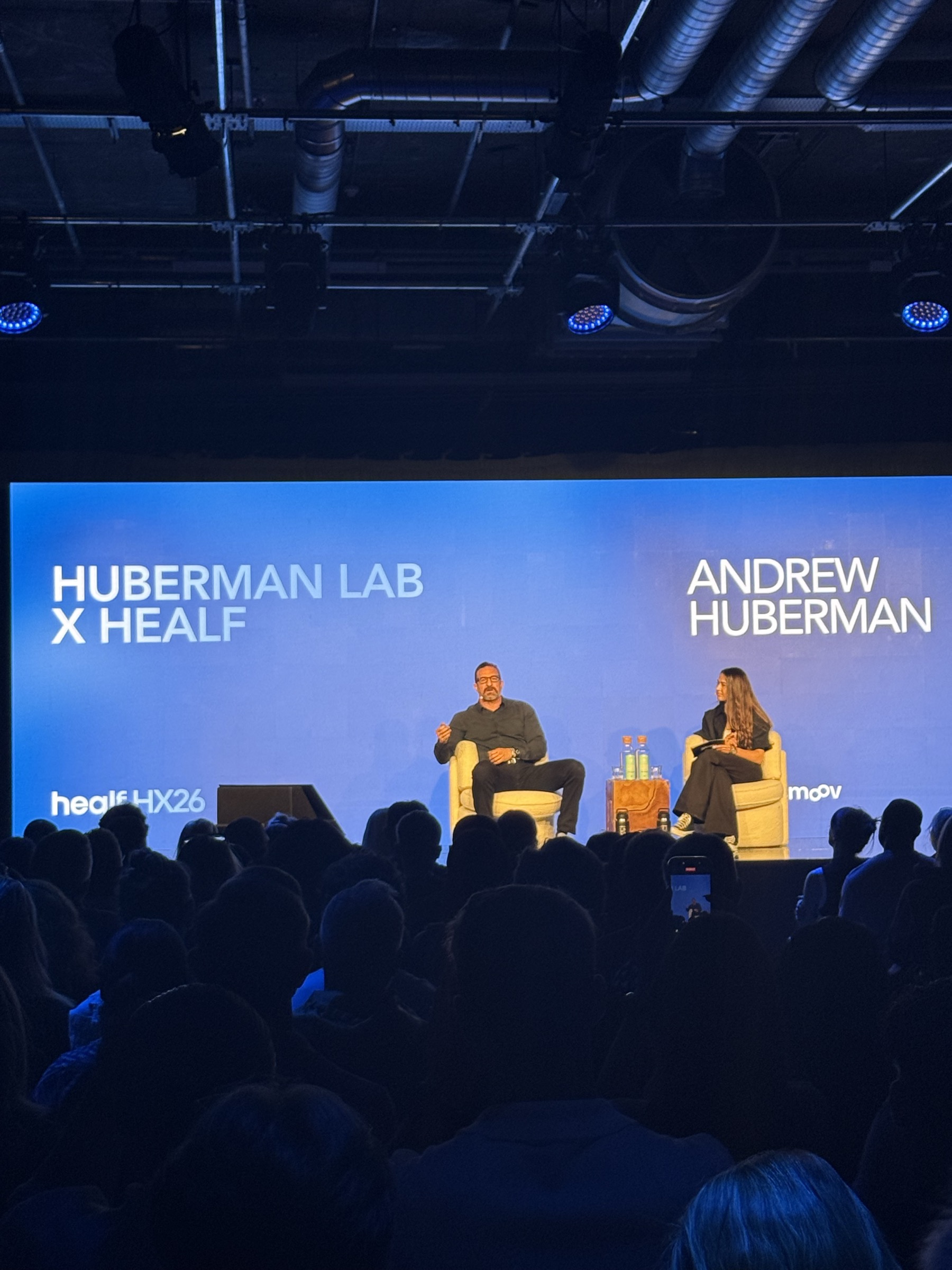 Andrew Huberman on stage during his Healf HX26 session in London, June 2026