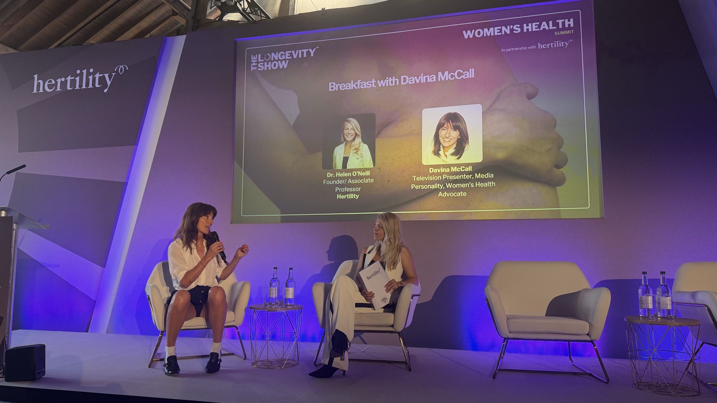 Davina McCall in conversation with Dr Helen O'Neill on stage at The Longevity Show, Tobacco Dock, London, June 2026