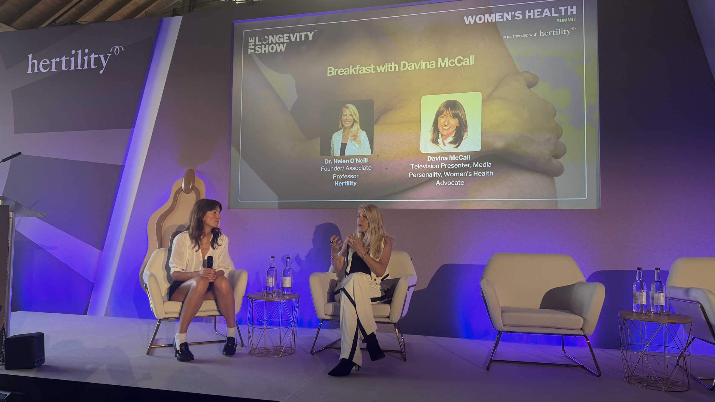 Dr Helen O'Neill making a point in conversation with Davina McCall at The Longevity Show, Tobacco Dock, London, June 2026